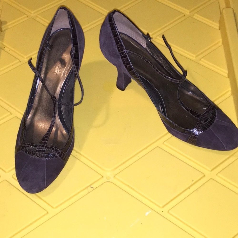 Sharp looking toe covered shoes with strap.